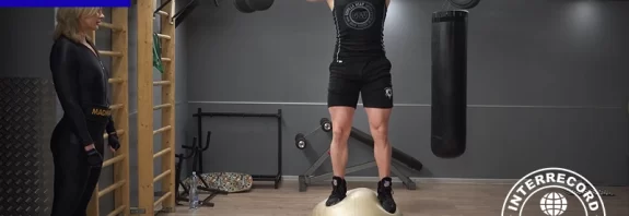 highest weight lifted with side lifts in one minute standing on the Swiss ball